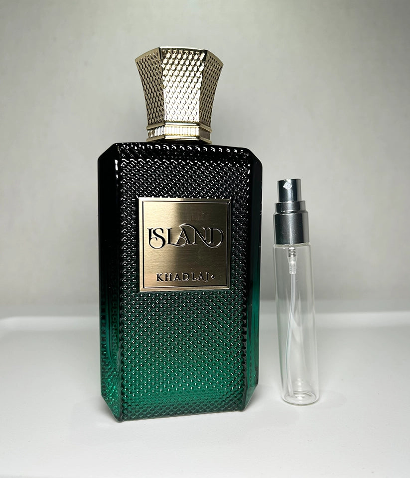 Island by Khadlaj - Perfume bottle with textured design and Island branding on a light gray background