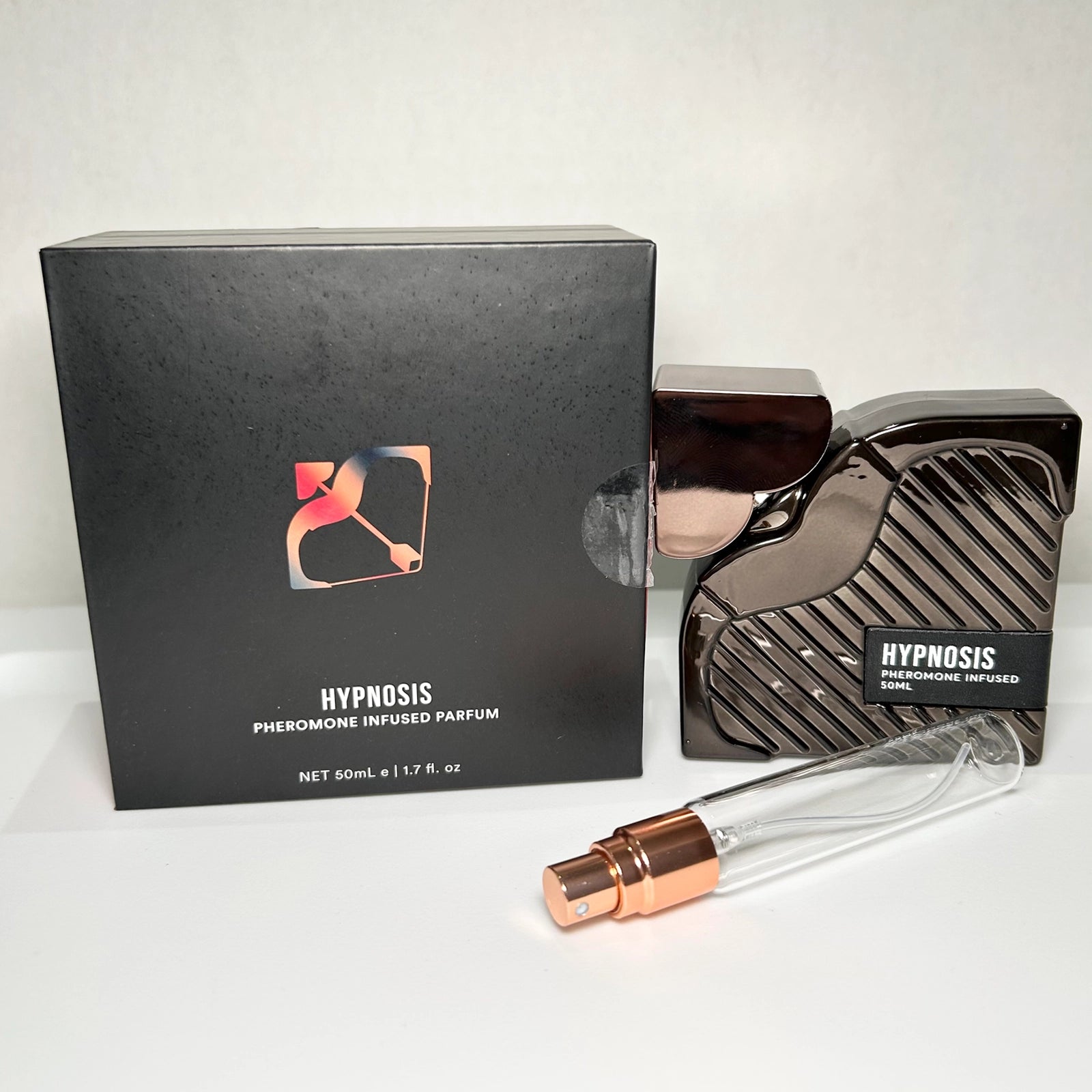 Cupid’s Hypnosis 3.0 pheromone-infused perfume with branded box and 8 mL travel-size bottle