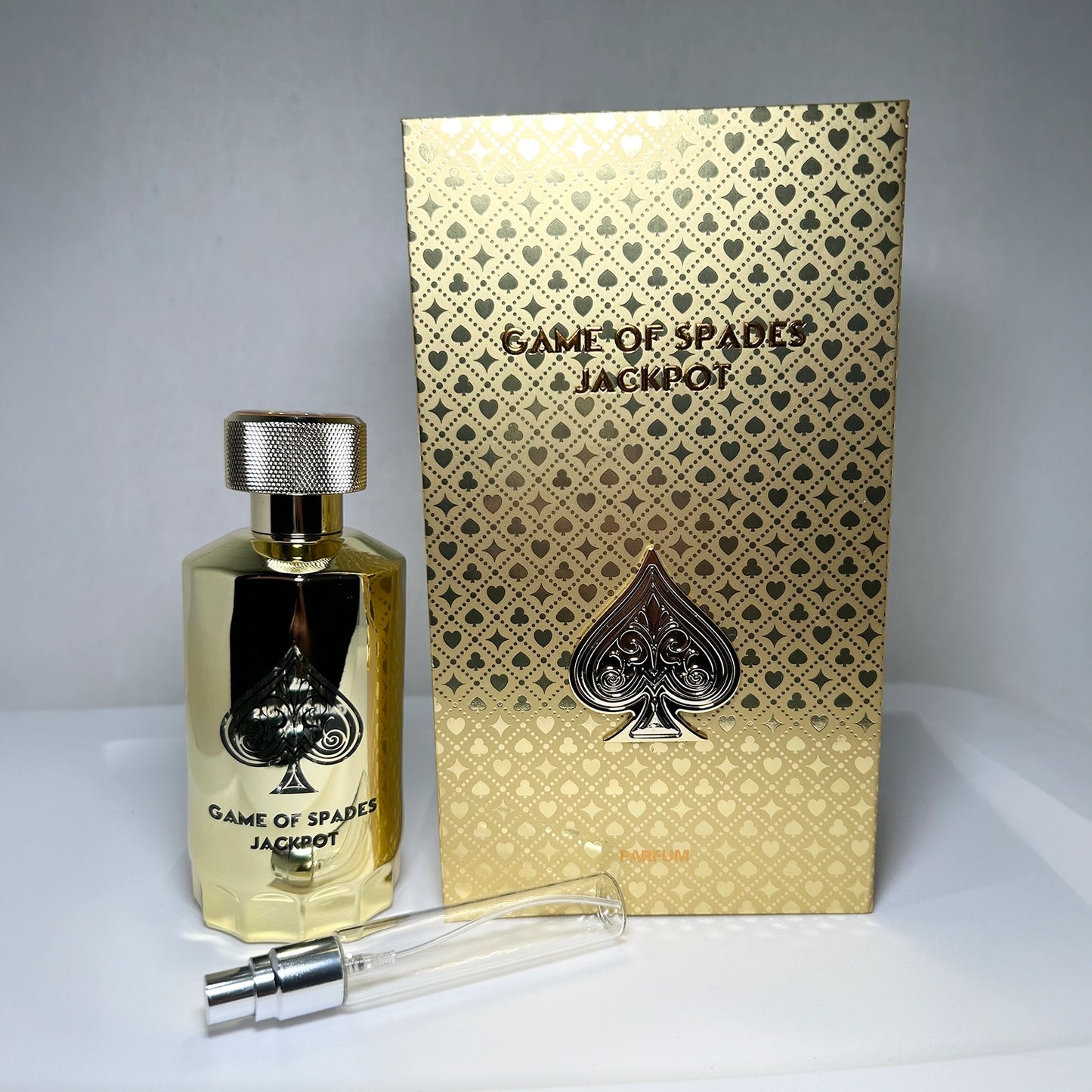 Game of Spades Jackpot by Jo Milano Paris with parfum bottle, branded box, and 8 mL travel-size decant sprayer, unisex luxury fragrance