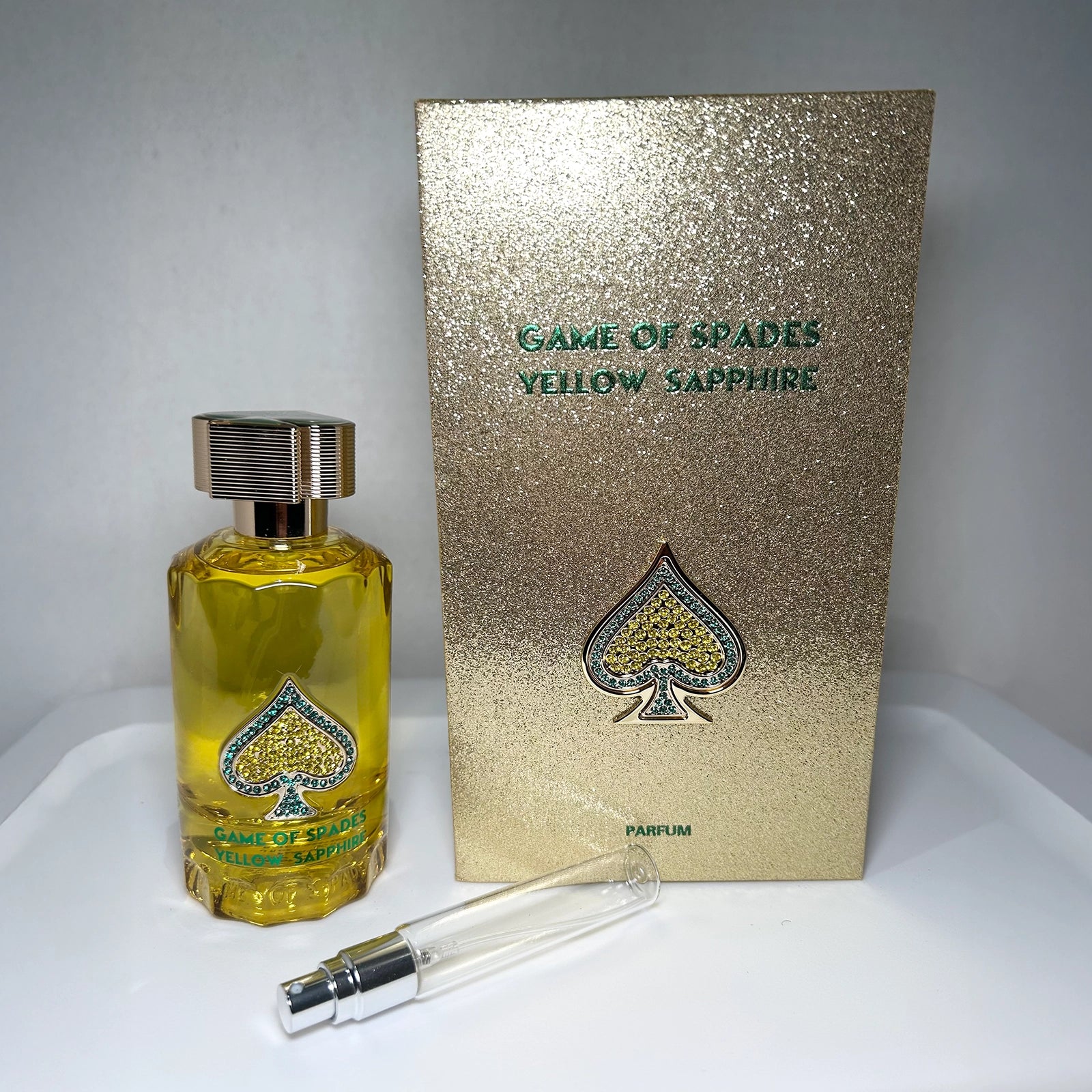 Game of Spades Yellow Sapphire by Jo Milano Paris with parfum bottle, branded box, and 8 mL travel-size decant sprayer, unisex luxury fragrance